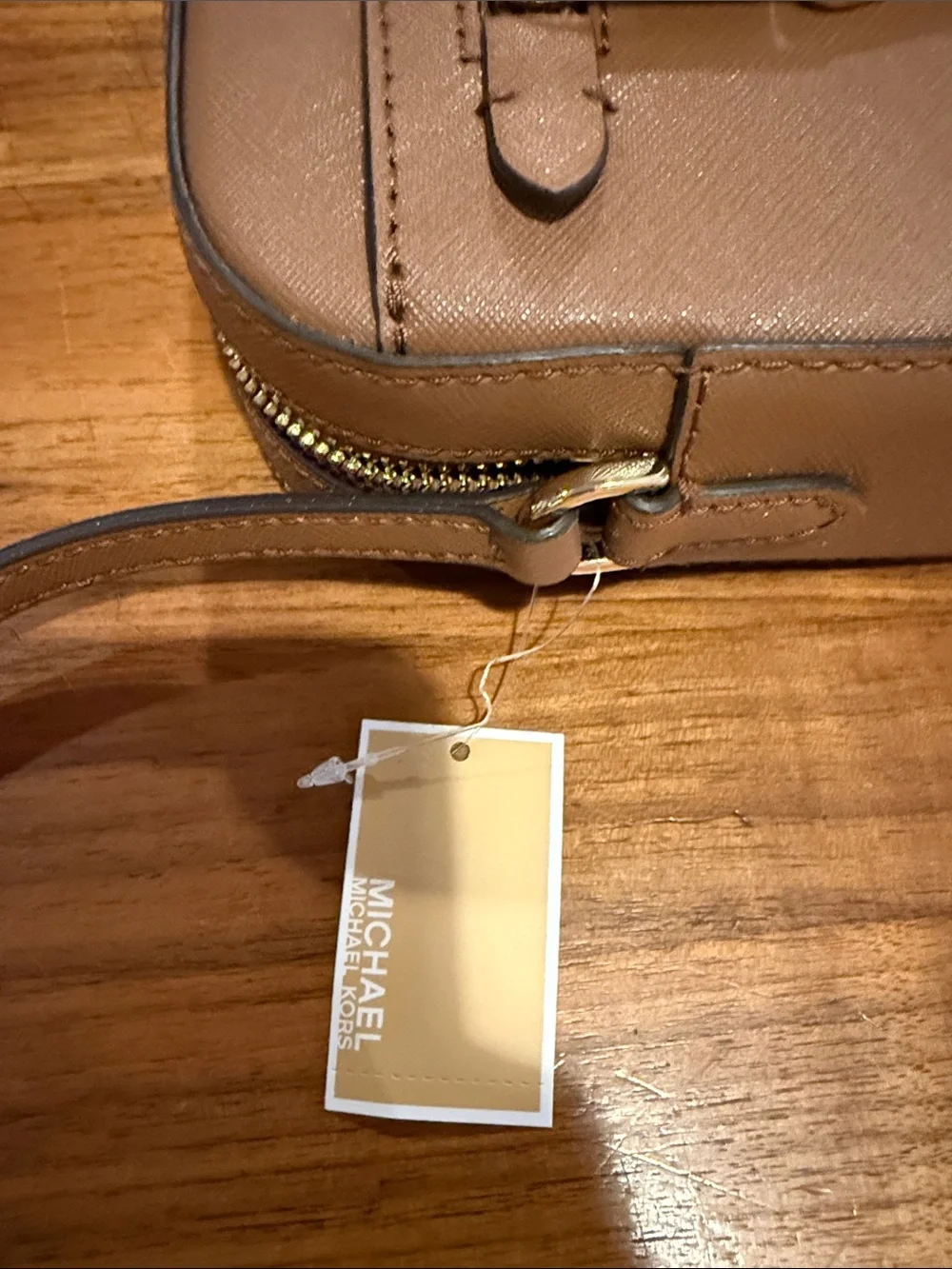 Michael Kors questions leave